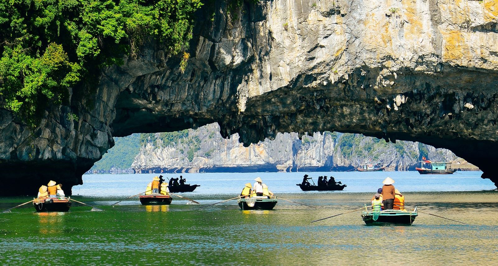 Admire stunning scenery with thousands of limestone mountains at Halong Bay