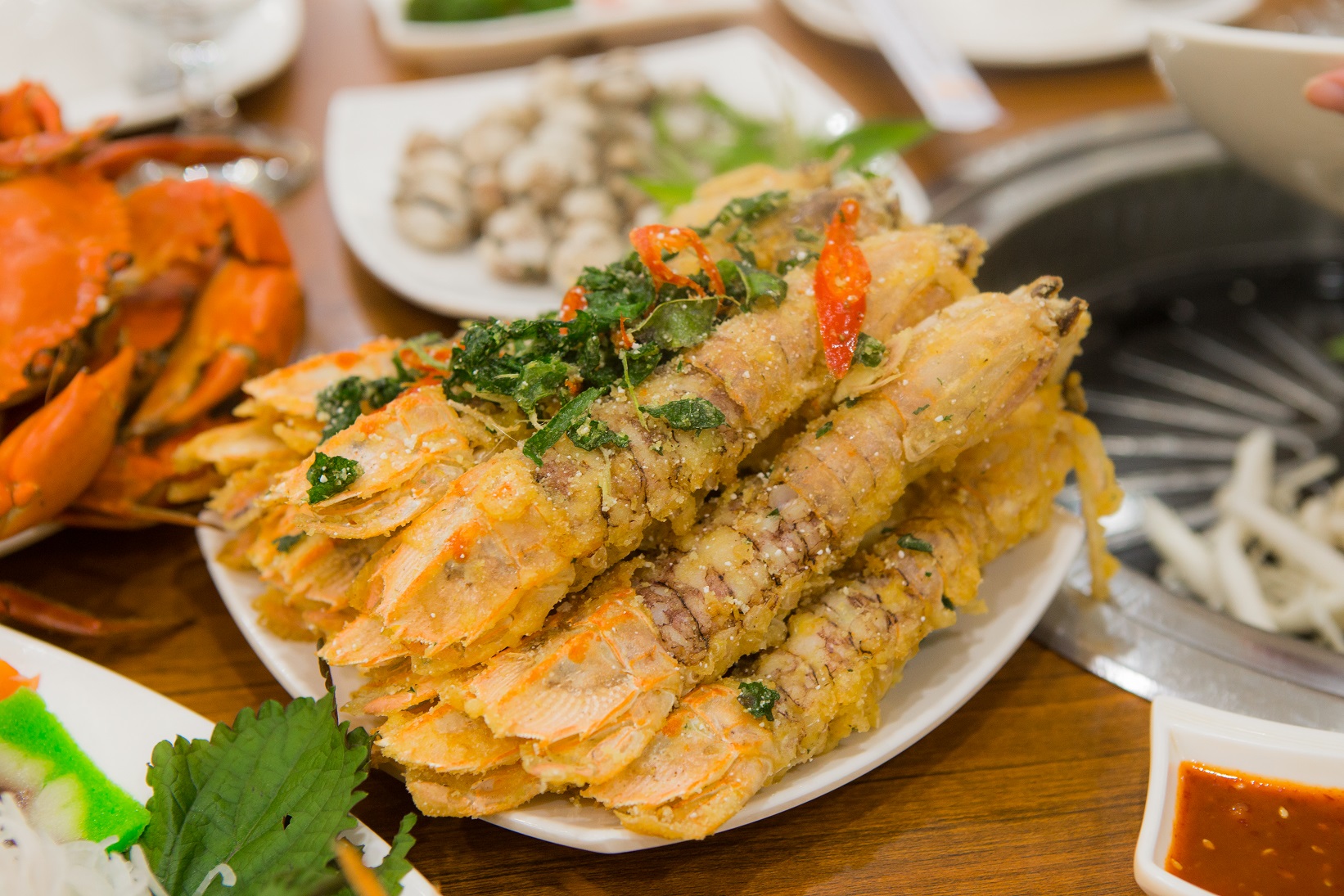 Crispy fried mantis shrimp, a flavorful example of Ha Long Bay seafood cuisine.