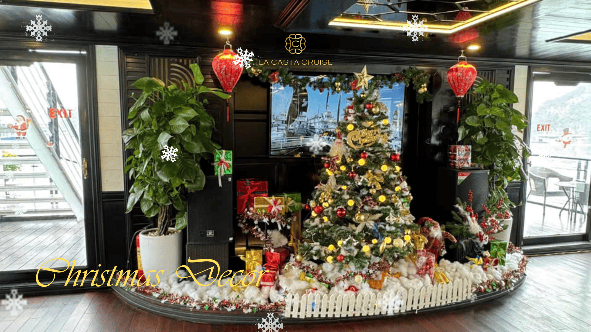La Casta Cruise interior decorated with sparkling Christmas tree and festive lights.