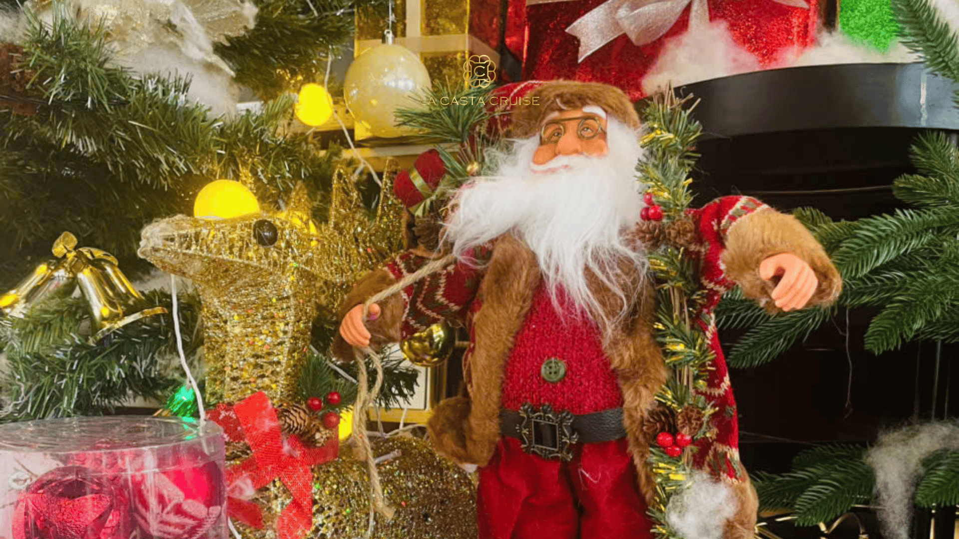 Santa Claus giving secret gifts to guests on La Casta Christmas cruise Lan Ha Bay.