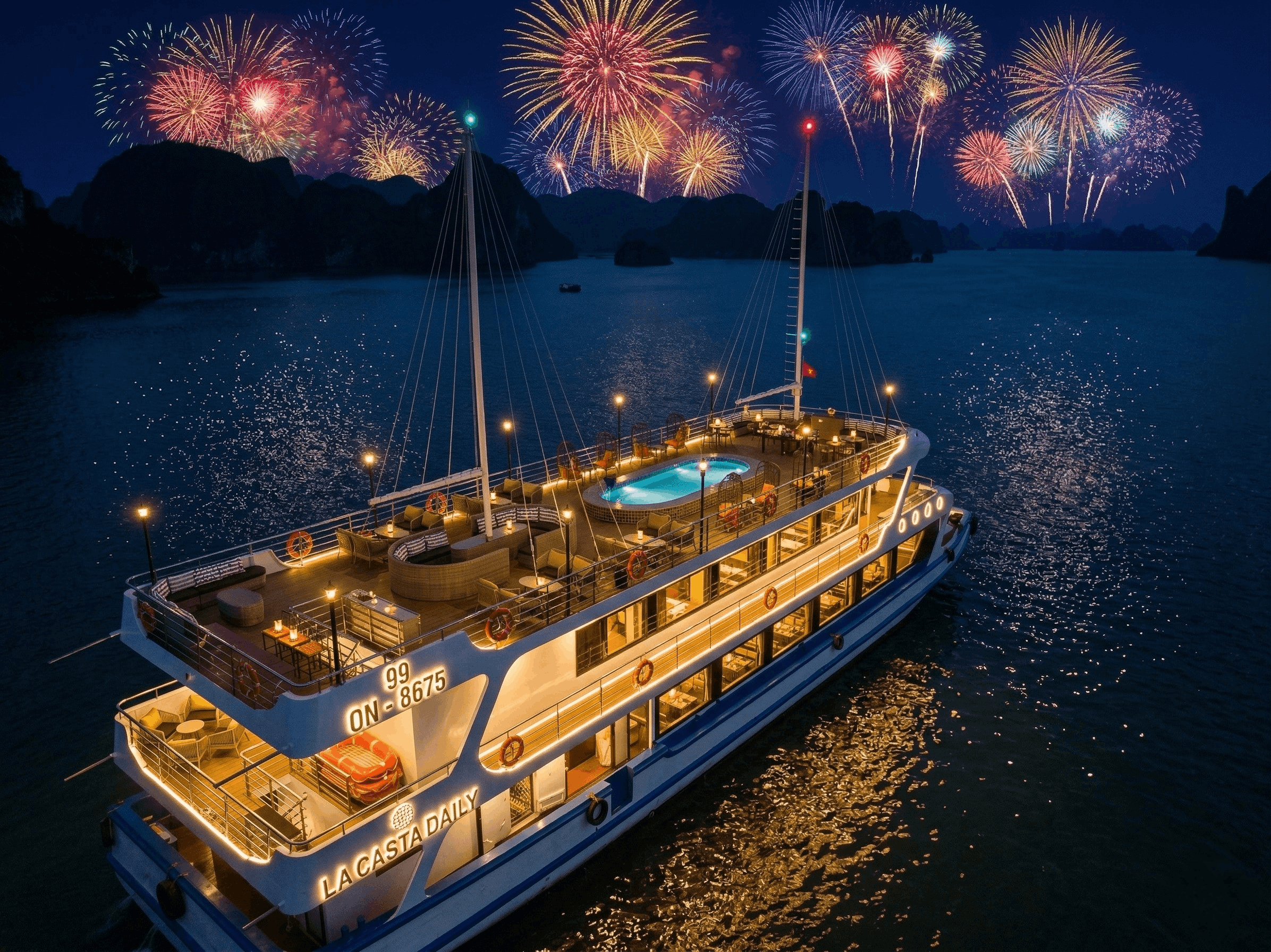 Guests admiring the spectacular April 30 Halong fireworks from the open-air sundeck of a luxury dinner cruise